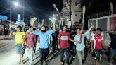 কুয়াকাটায় ইউএনওর বিরুদ্ধে ঝাড়ু মিছিল